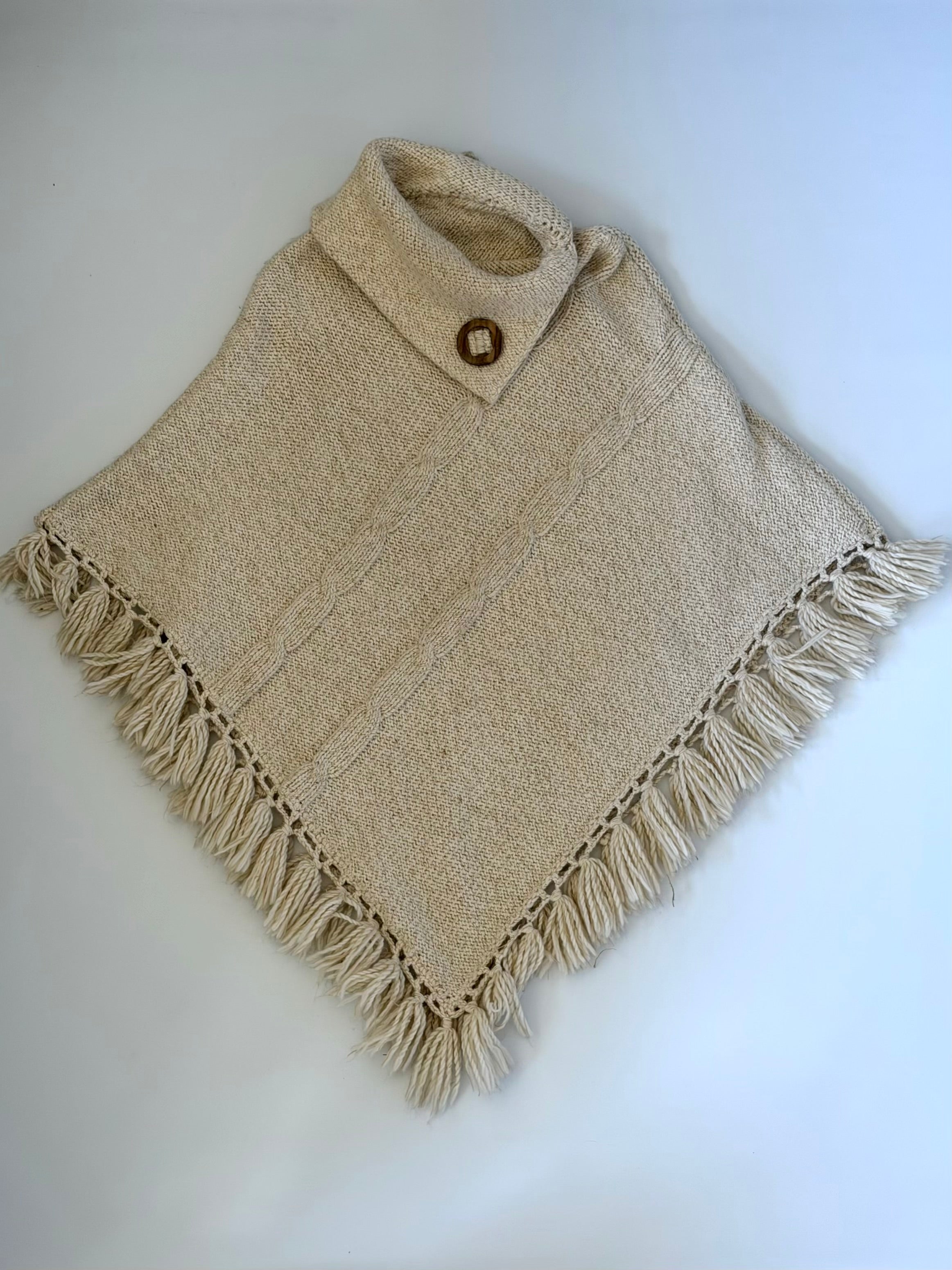 Strikket poncho